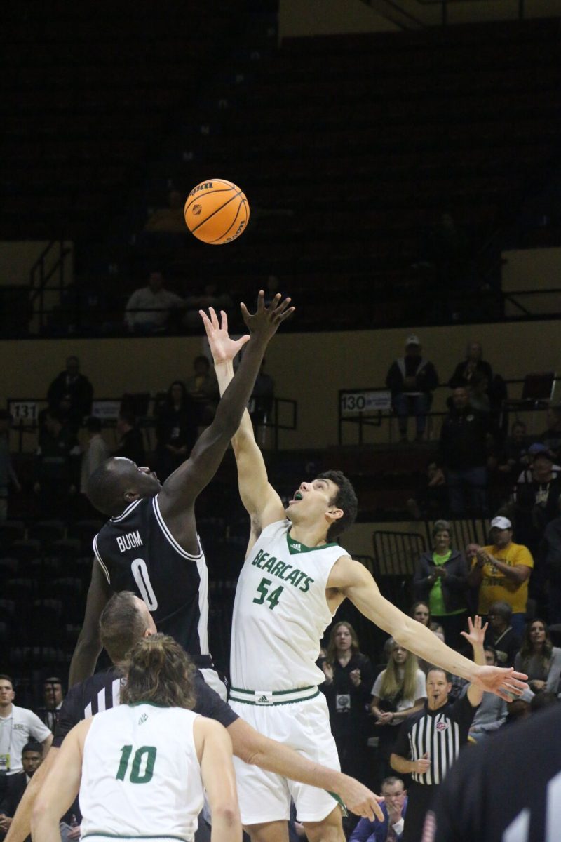 Sophomore center Mayuom Buom starts the Semifinals game with a tipoff against junior forward Luke Waters from Northwest Missouri State.&#160;