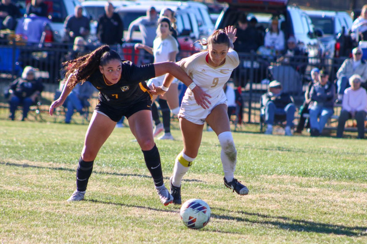 Senior midfielder Angela Palmer attempts to beat Fort Hays opponent to the ball during the first round game at ESU Pitch on Nov. 17.&#160;