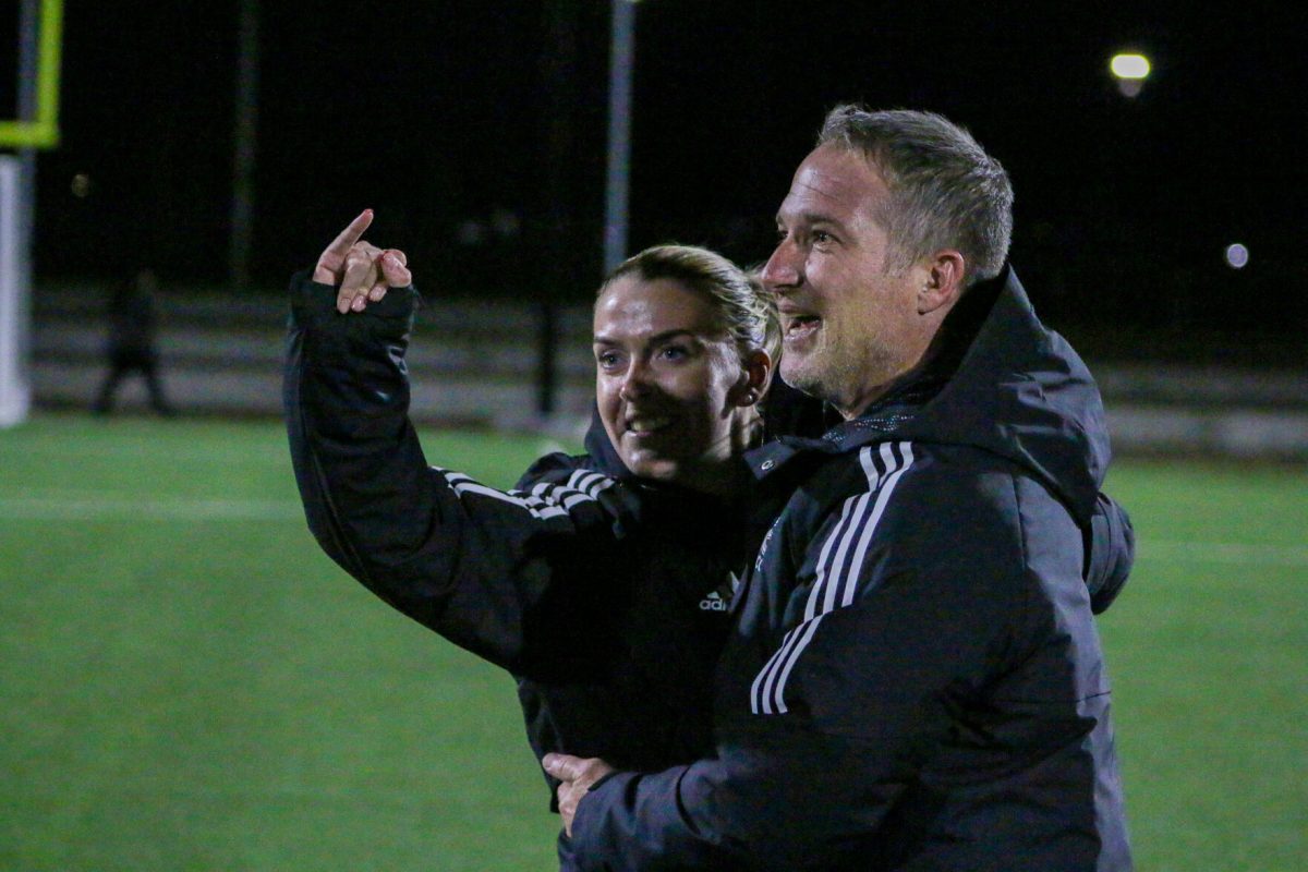 (Left) Interim head coach Chloe Marquez, and (Right) previous head coach Bryan Sailer celebrate together after winning the MIAA conference tournament on Nov. 11 against Central Missouri University, 3-2.
&#160;