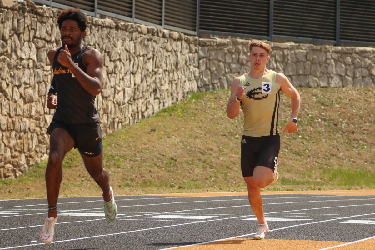 Sophomore Jack Watson competes in the 400 meter dash. Watson ended up finishing in second place overall.