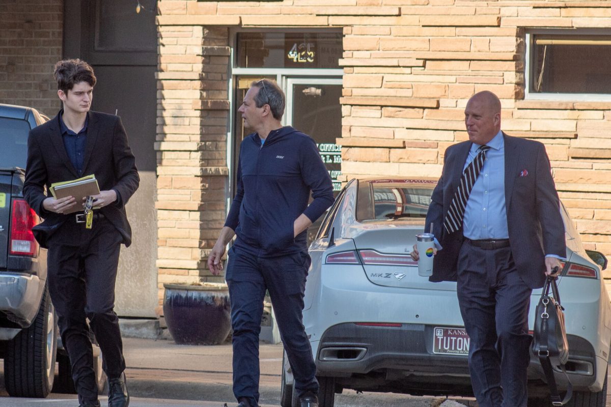Dominik Simunovic,&#160;Dario Simunovic, and&#160;Frederick L. Meier walk across the road to the Lyon County District Court on the fifth and final day of trial on May 3.&#160;