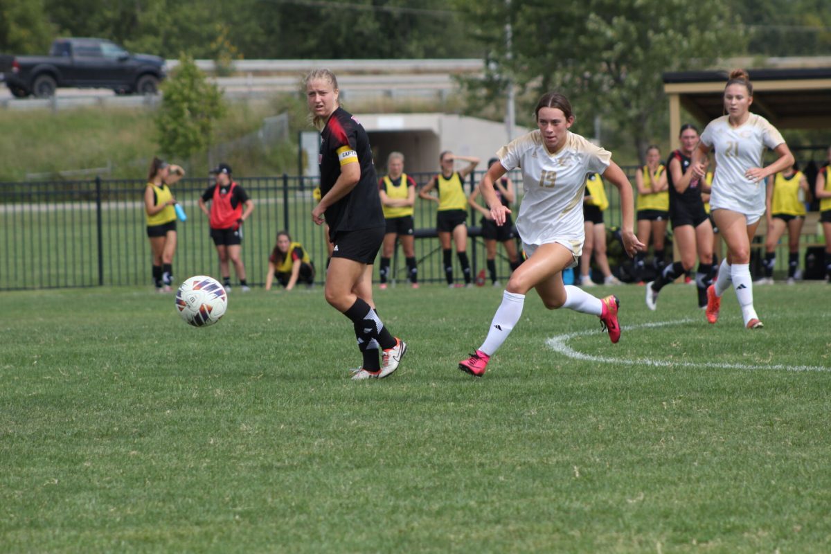 Freshman midfielder Madeline Bracy tracks the ball down the field in a non-conference match against Drury University on Sept. 18.&#160;