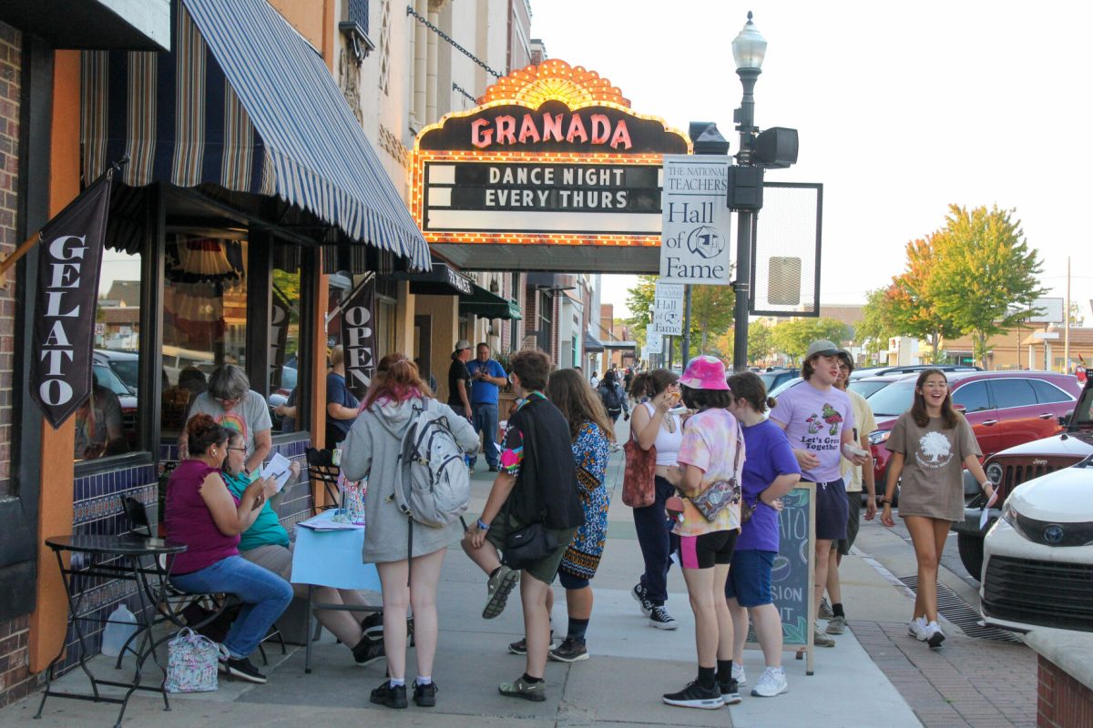 Community members gather on Sept. 6 on Commercial Street for the Emporia First Friday Art Walk.&#160;