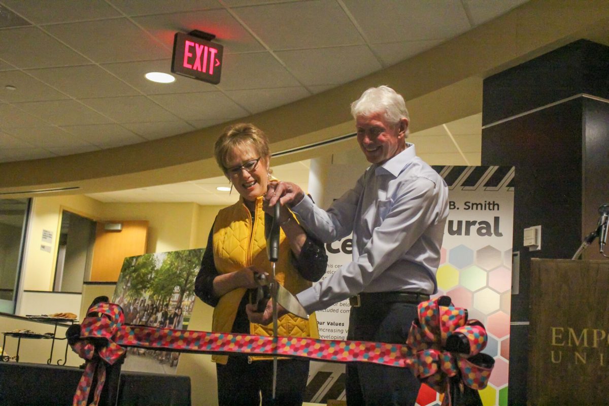 Carla and Roger Smith cut the ribbon for the opening of the Intercultural Center on Nov. 13 infront of crowd of Emporia State students, staff, Alumni, and other Emporians.