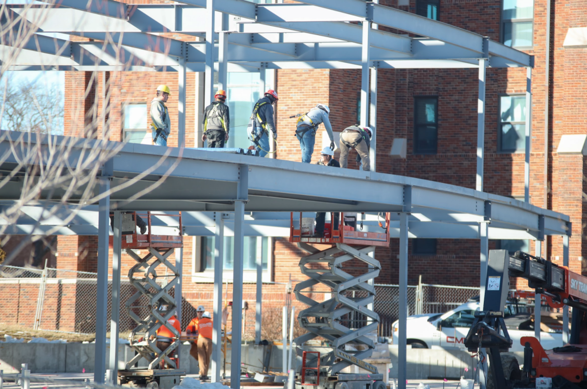 Crews working on the east side of the nursing building midday on January 28.