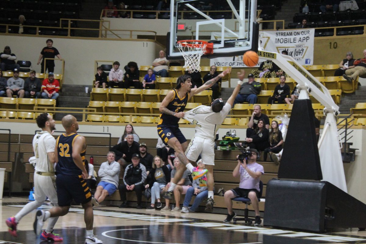 Sophomore guard Arhman Lewis and Israel Hart of the Bronchos battle for the ball on Feb. 2 in White Auditorium.&#160;