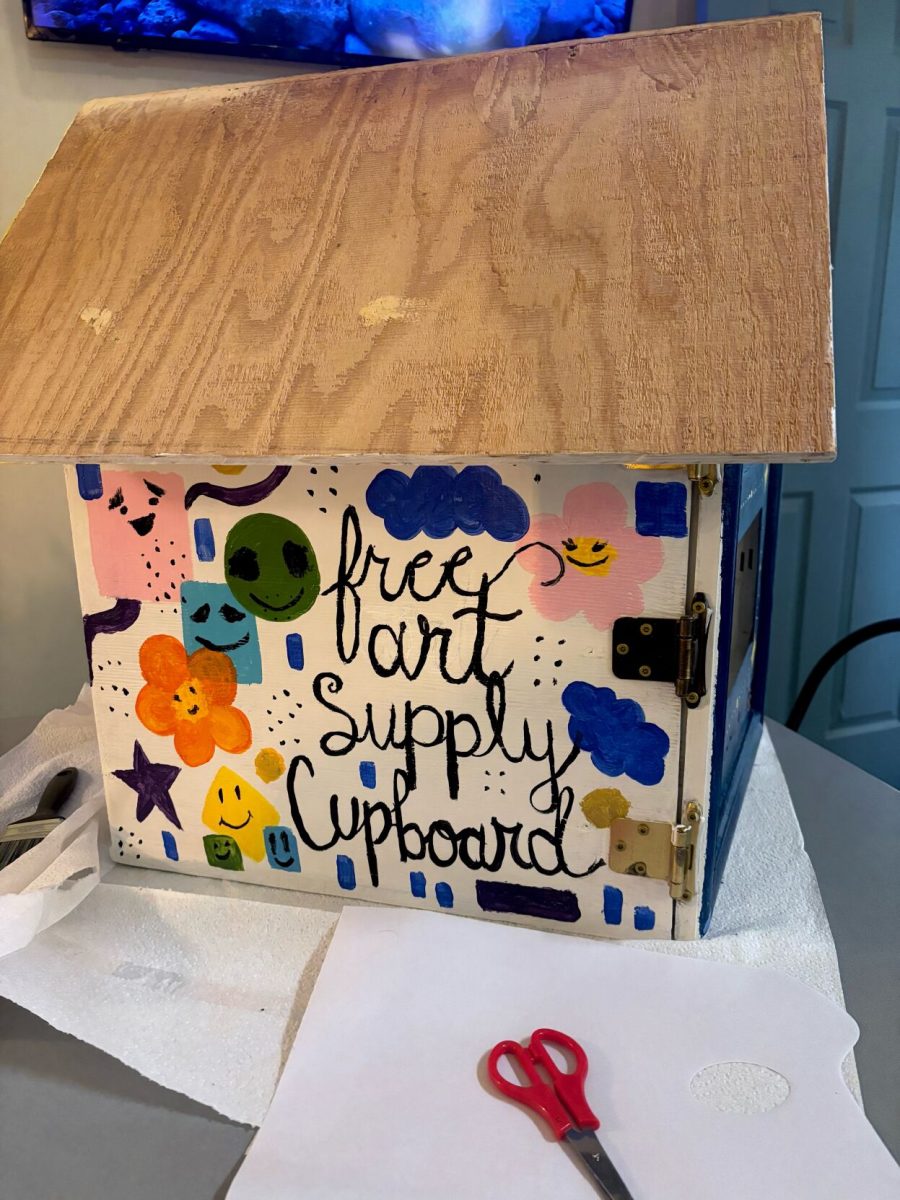 Emporia community members painted a diverse set of designs onto the art supply cabinet that is set to be installed at Bloom House Youth Services on March 12.&#160;