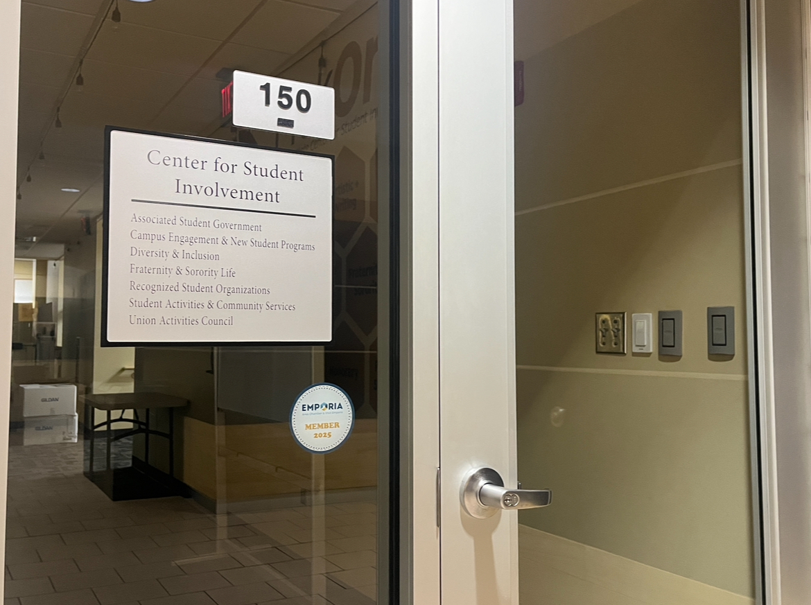 A sign reads “Center for Student Involvement” by the door to the Student Life Office located on the first floor of the Memorial Union.