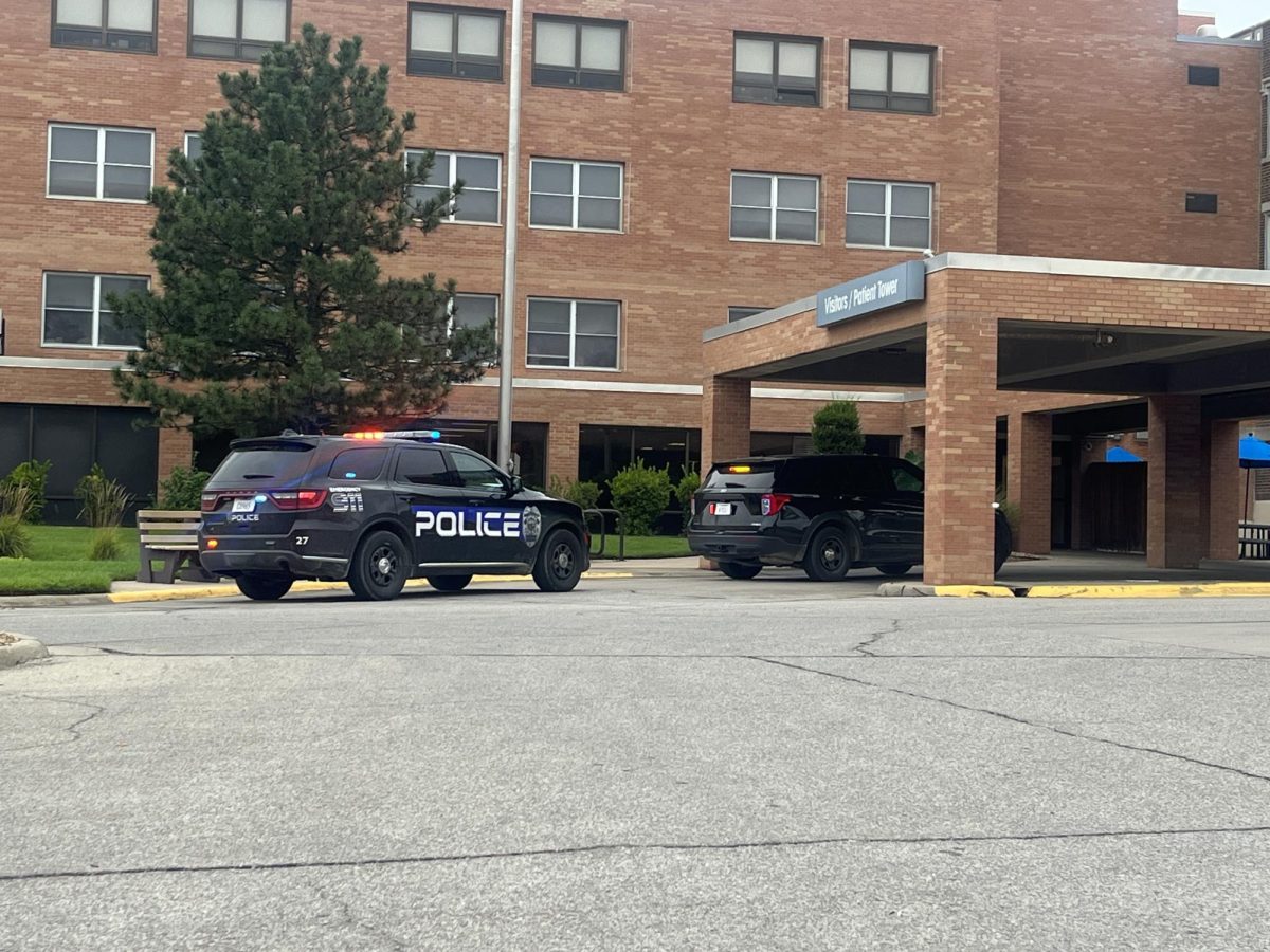Two Emporia Police Department vehicles outside the visitor entrance at Newman Regional Health after police responded to an false active shooter alarm. 