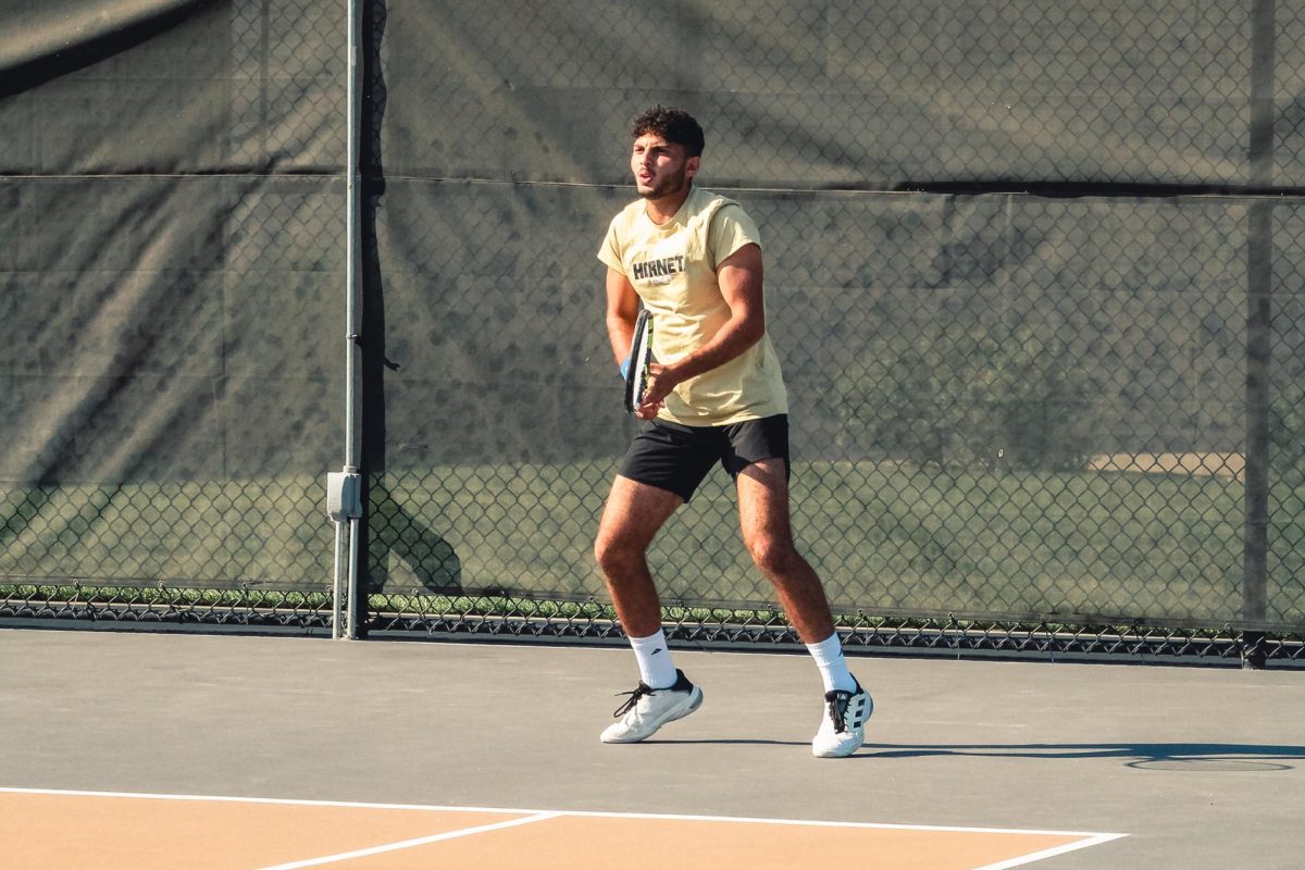 Junior Mostafa Elbasnaly bounces on his toes during a singles match on Sept. 6. 