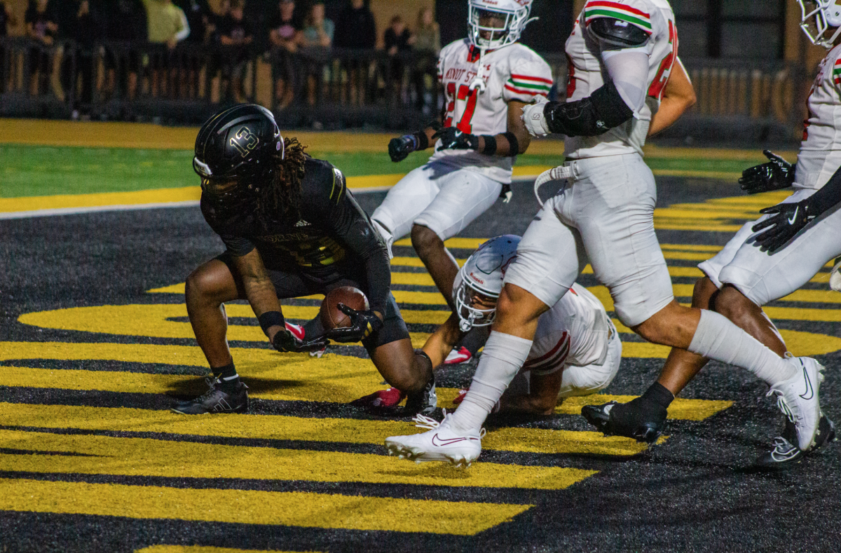 Redshirt sophomore Malik O'Atis scores a touchdown for the Hornets during the season opener on Aug. 28 against Minot State.