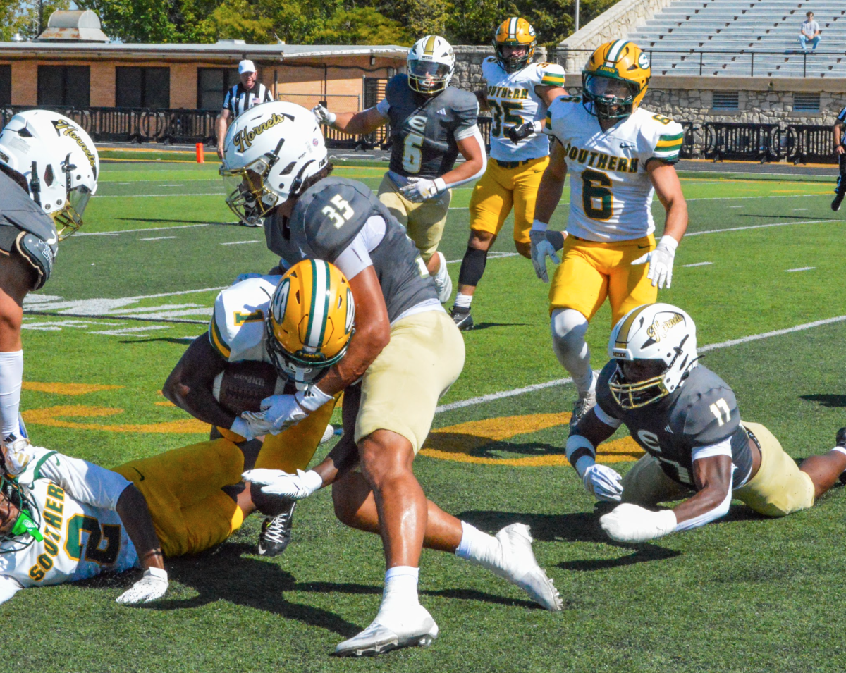 Freshman defensive back Aiden Hicks stops the Missouri Southern offensive with a tackle. 