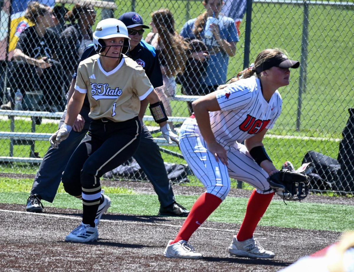 Behind a Jennies infielder, sophomore infielder Sydney Wagner looks to advance on the bases during the MIAA Tournament quarterfinals game against the Central Missouri Jennies on May 7. The Hornets came out on top in a 7-0 shutout win over the Jennies before falling to top-seeded Missouri Southern in the semifinals. 